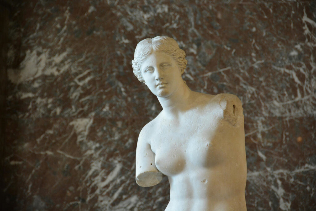 Venus de Milo statue on display in the Louvre Museum, Paris