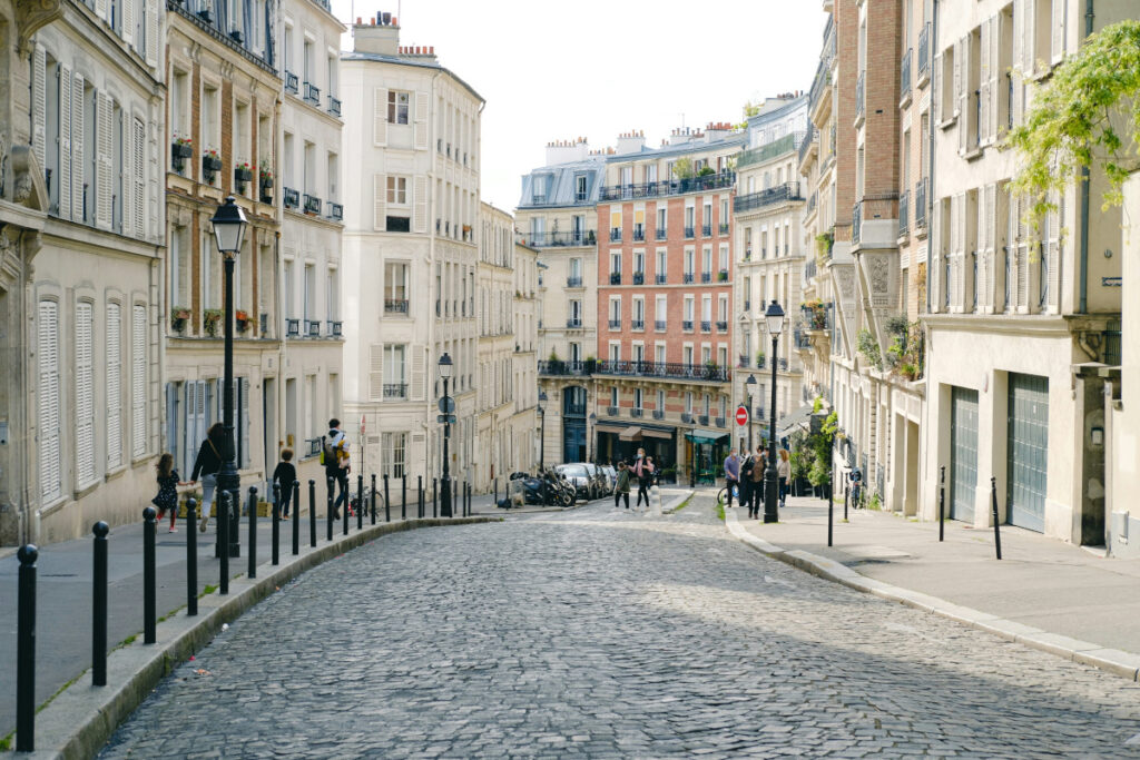 Charming street with colored buildings in Montmartre, Paris