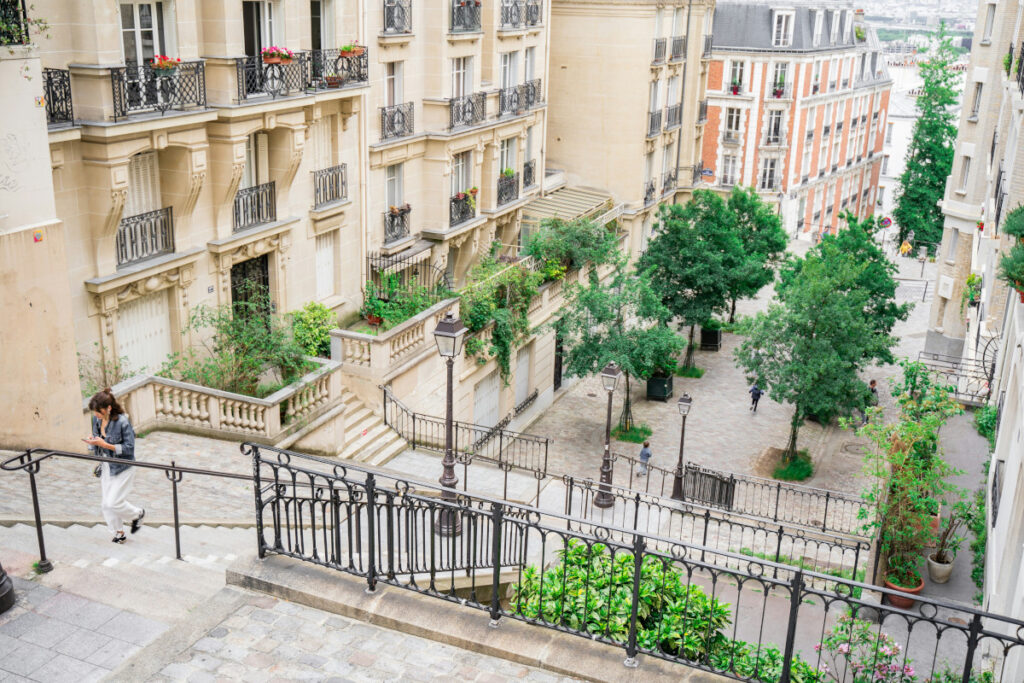 Beautiful pedestrian street with stairs in Montmartre, Paris