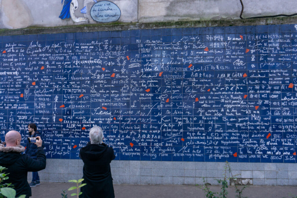 Wall of Love mural in Montmartre, Paris featuring the phrase 'I love you' in 311 languages